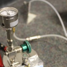 Indoor air sampling canister used to measure subsurface soil gas during a vapor intrusion assessment