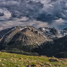 Picture of Rocky Mountains with dark clouds in the sky