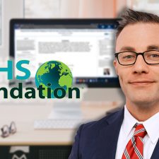 Collin Martin in front of computer background with poster presentation for AEHS Conference