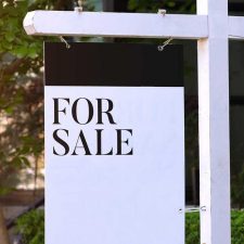 For sale sign outside of potentially contaminated drycleaner property